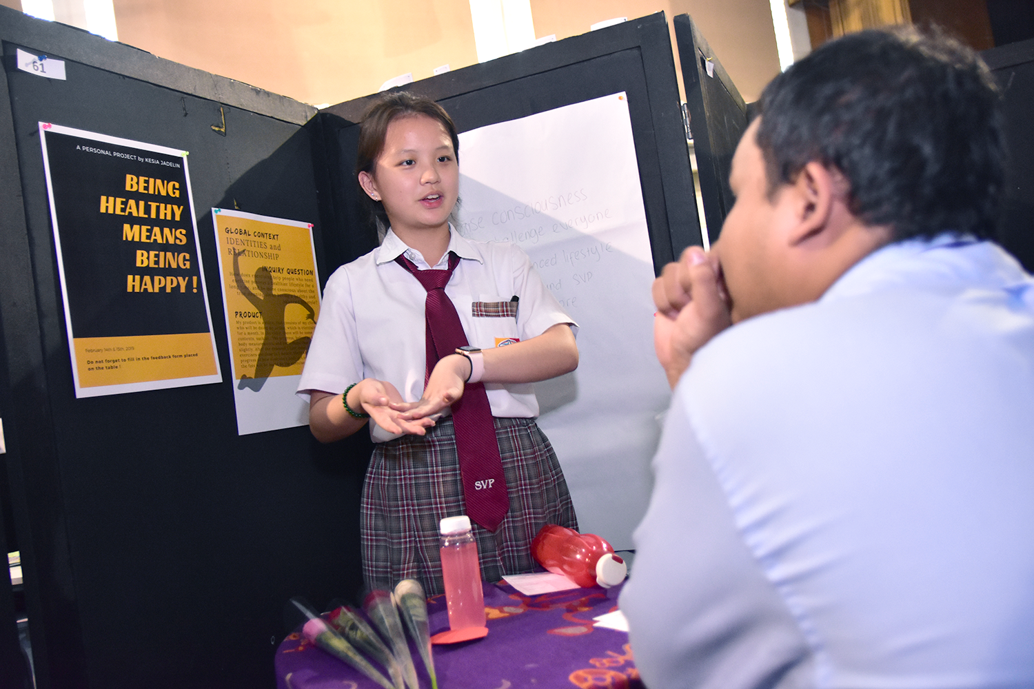 An IB middle years programme student is presenting in front of an audience