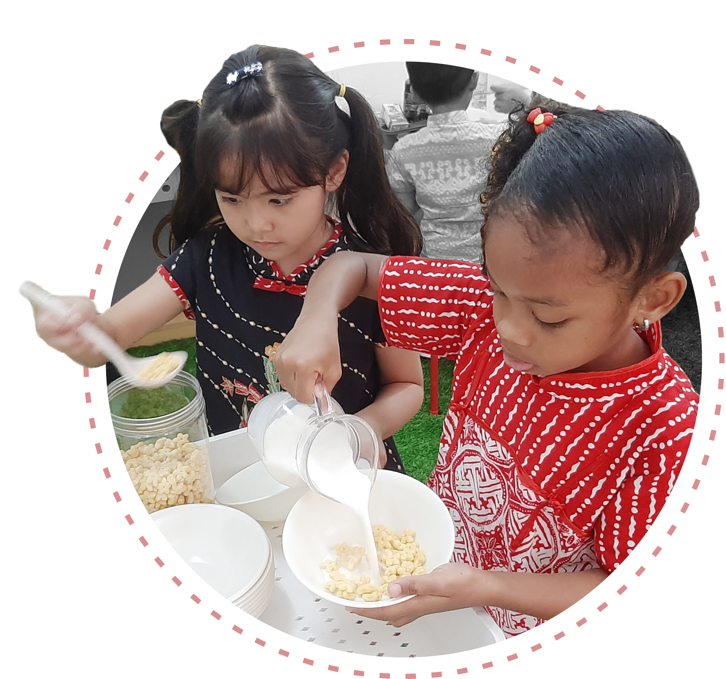 Two students of Early Childhood Education Programme of Sekolah Victory Plus - The renowned International Baccalaureate School in Inodnesia are cooking