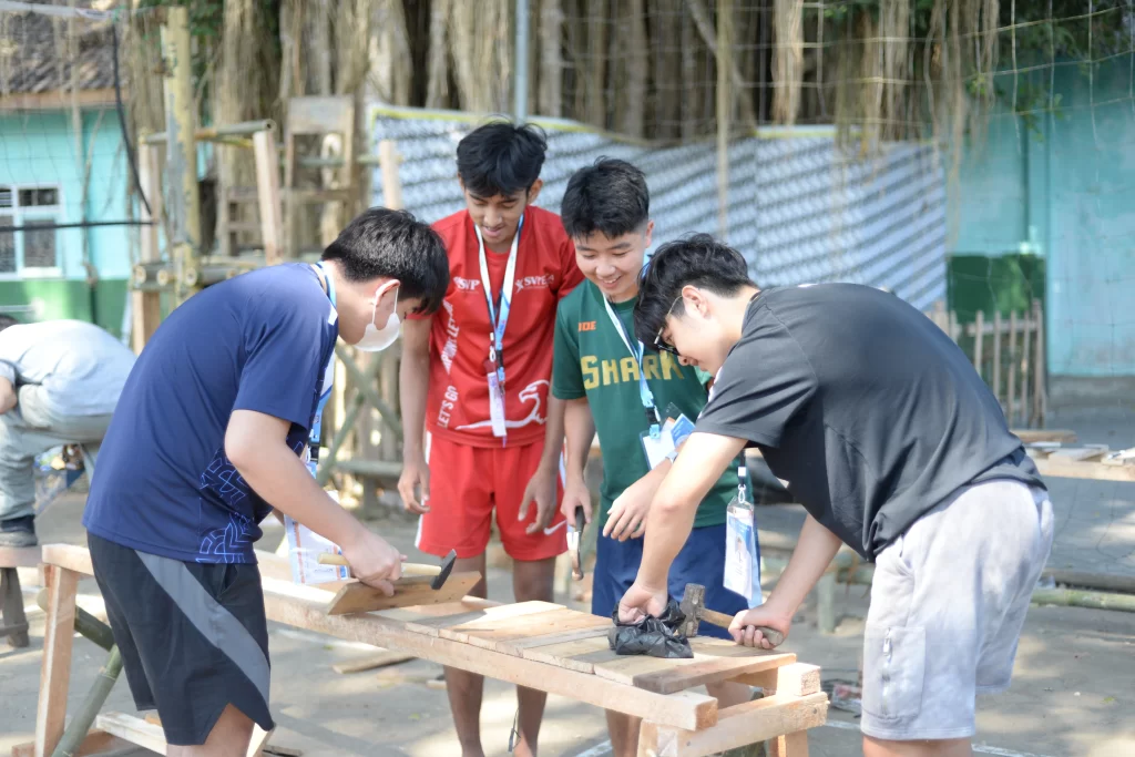 Sekolah Victory Plus students built volleyball field in Giripurwo village drig the CAS project.